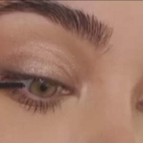 a close up of a woman's eye with a mascara